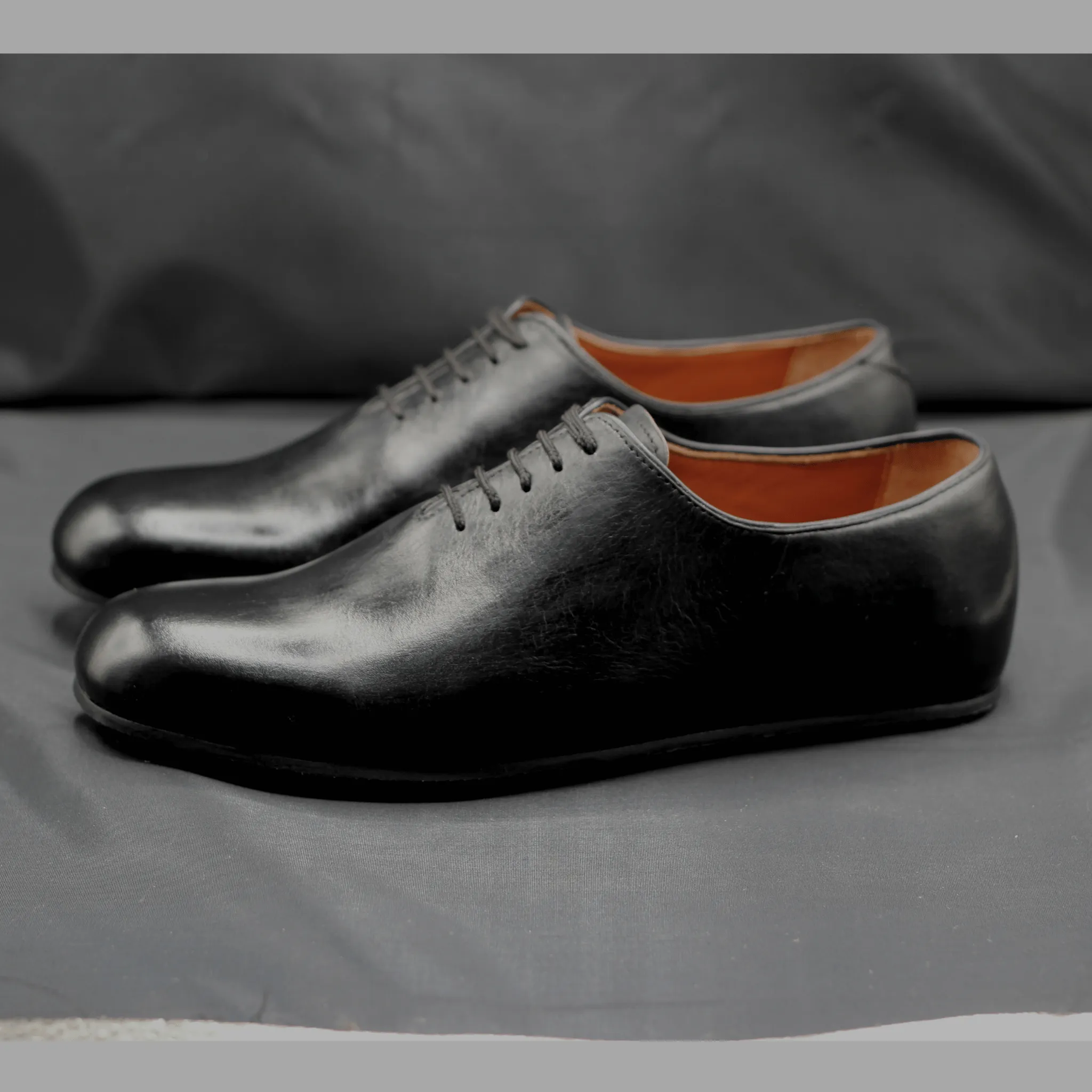 Handmade Black Wholecut Oxford Shoes – Timeless Elegance for Men Timeless Black Leather Oxfords – Handmade Wholecut Craftsmanship